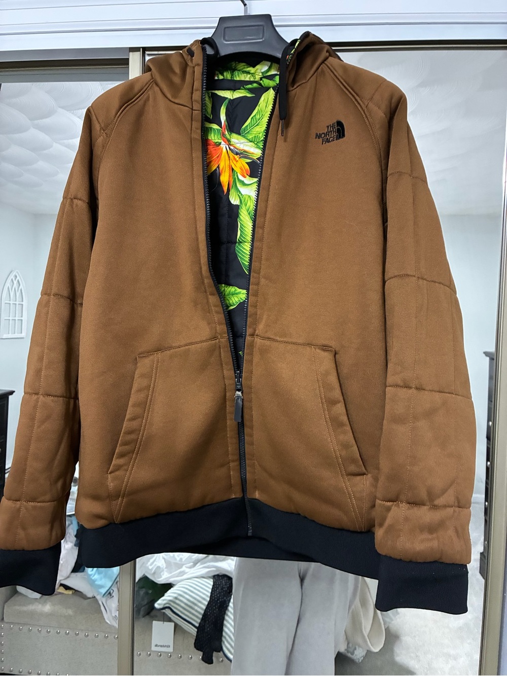 The North Face Men's Brown Hooded Puffer Jacket with Black Accents